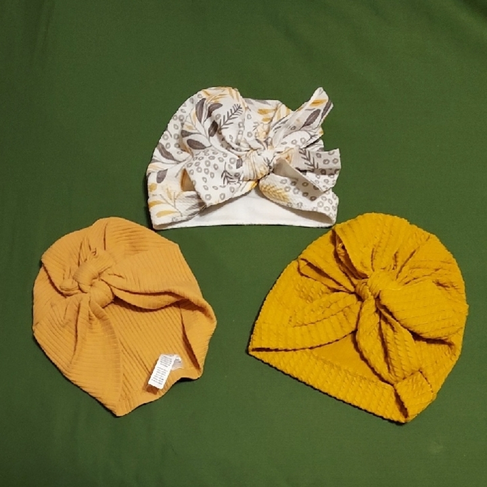 Vibrant Yellow and Orange Knotted Hats